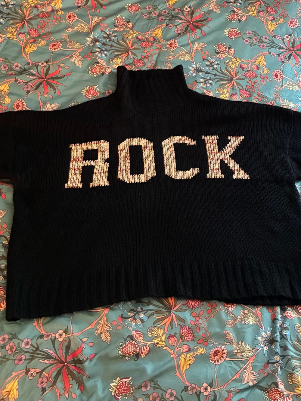 Elan Black Turtleneck Sweater with White 'ROCK' Graphic